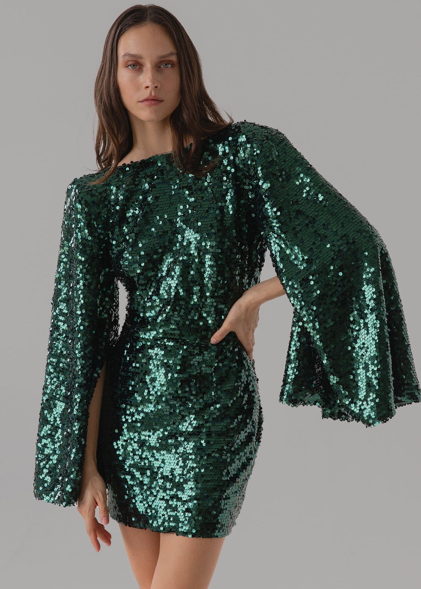 Green sequin dress with flared statement sleeves