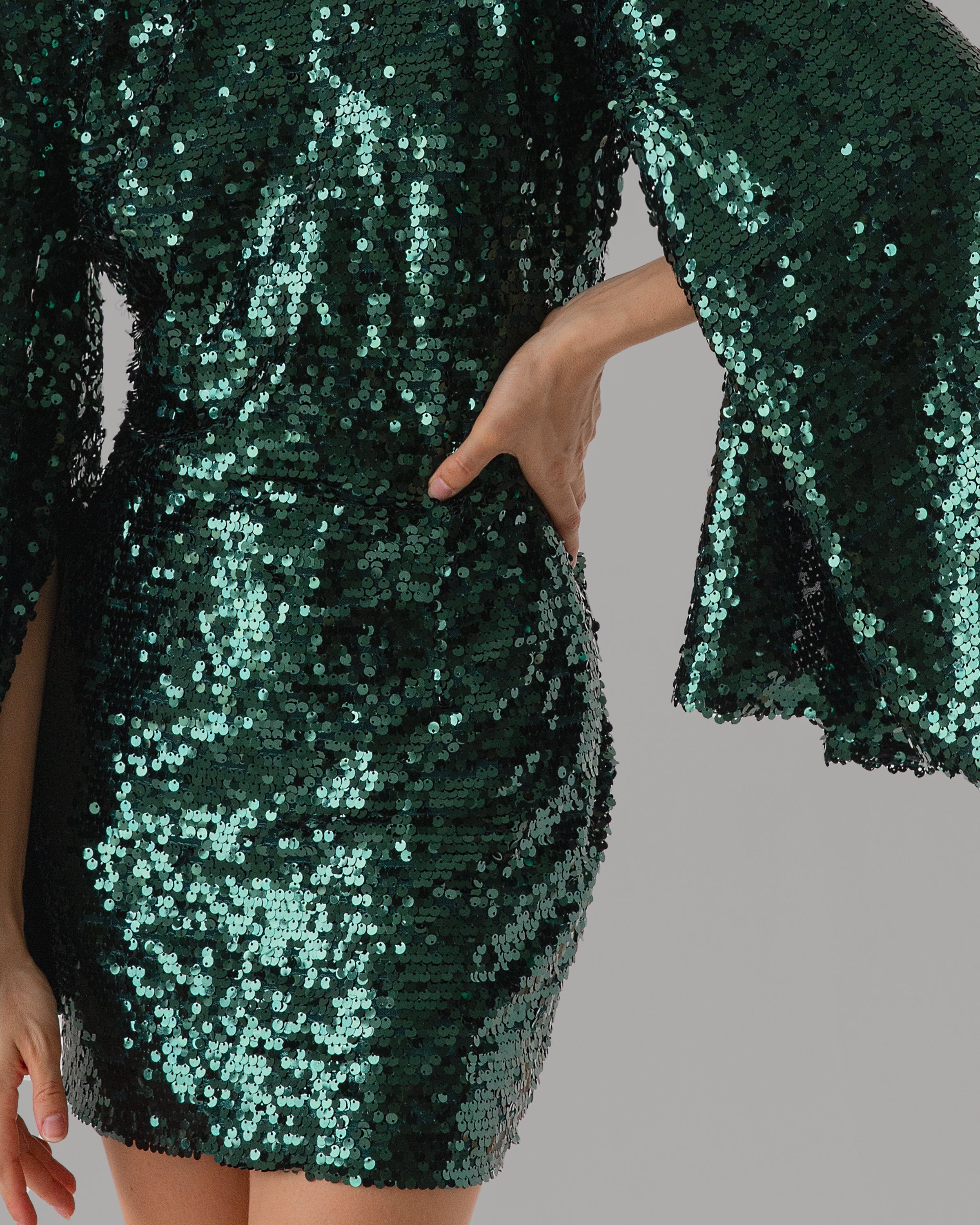 Green sequin dress with flared statement sleeves