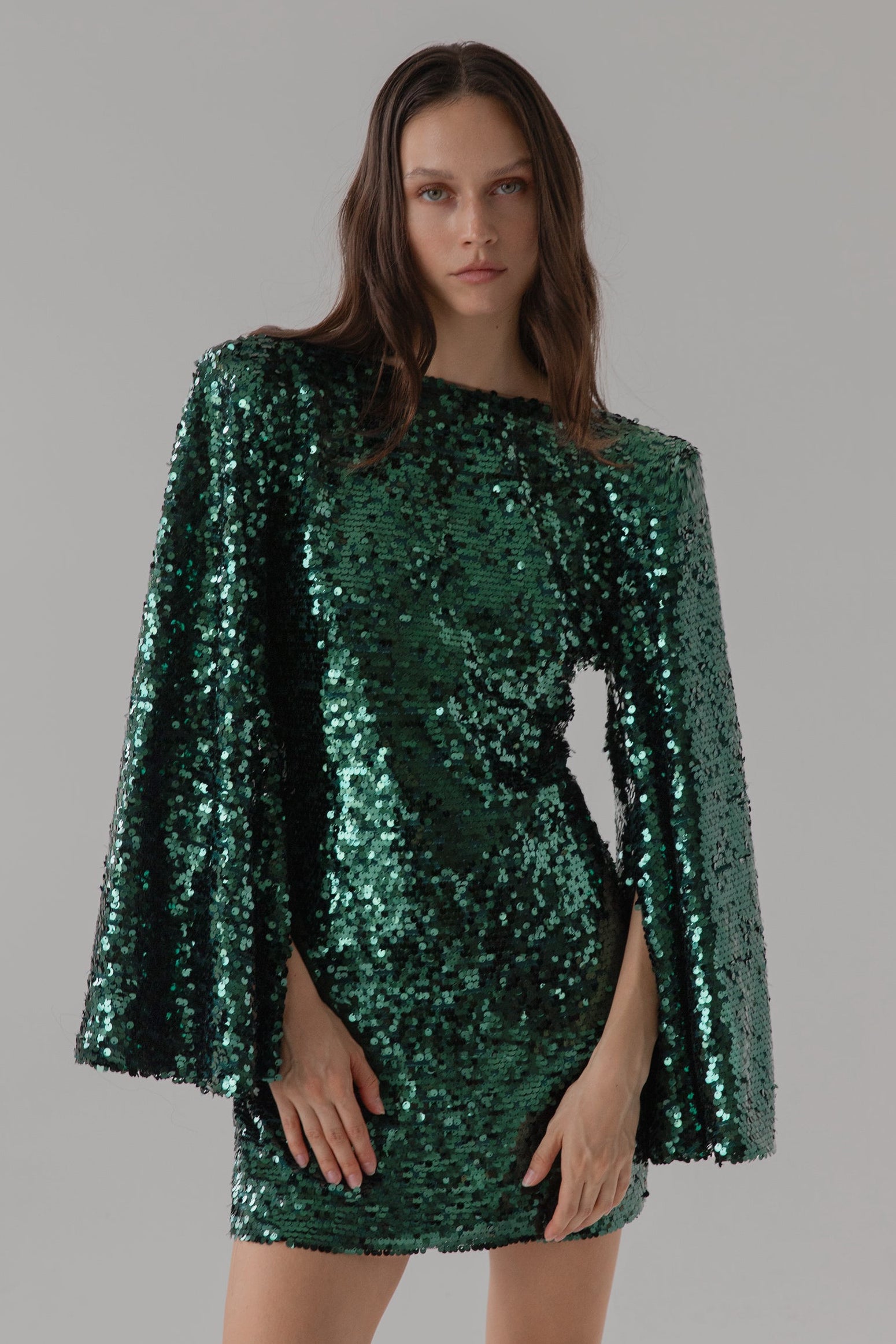Green sequin dress with flared statement sleeves