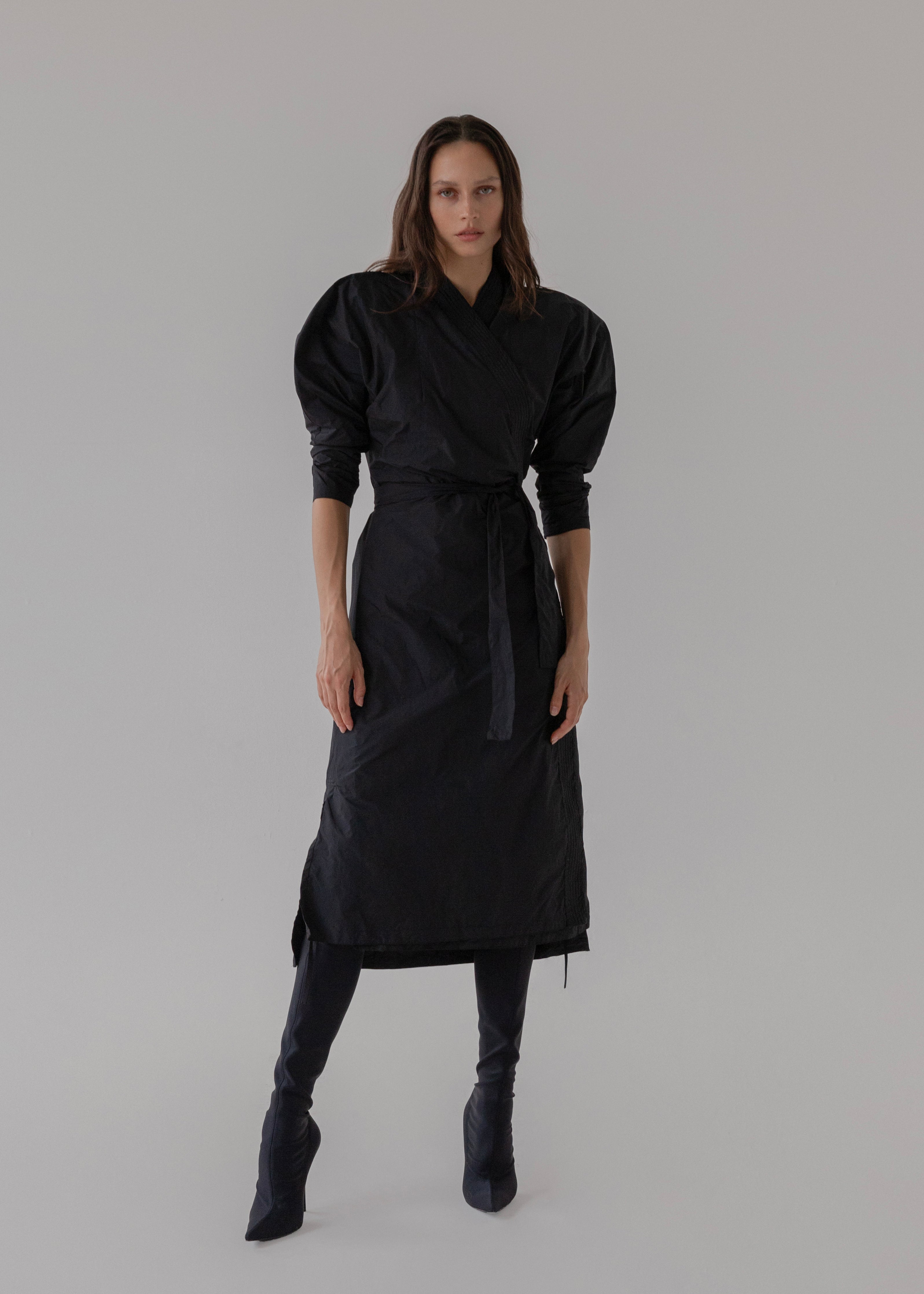 Model wears black wrap kimono style dress 