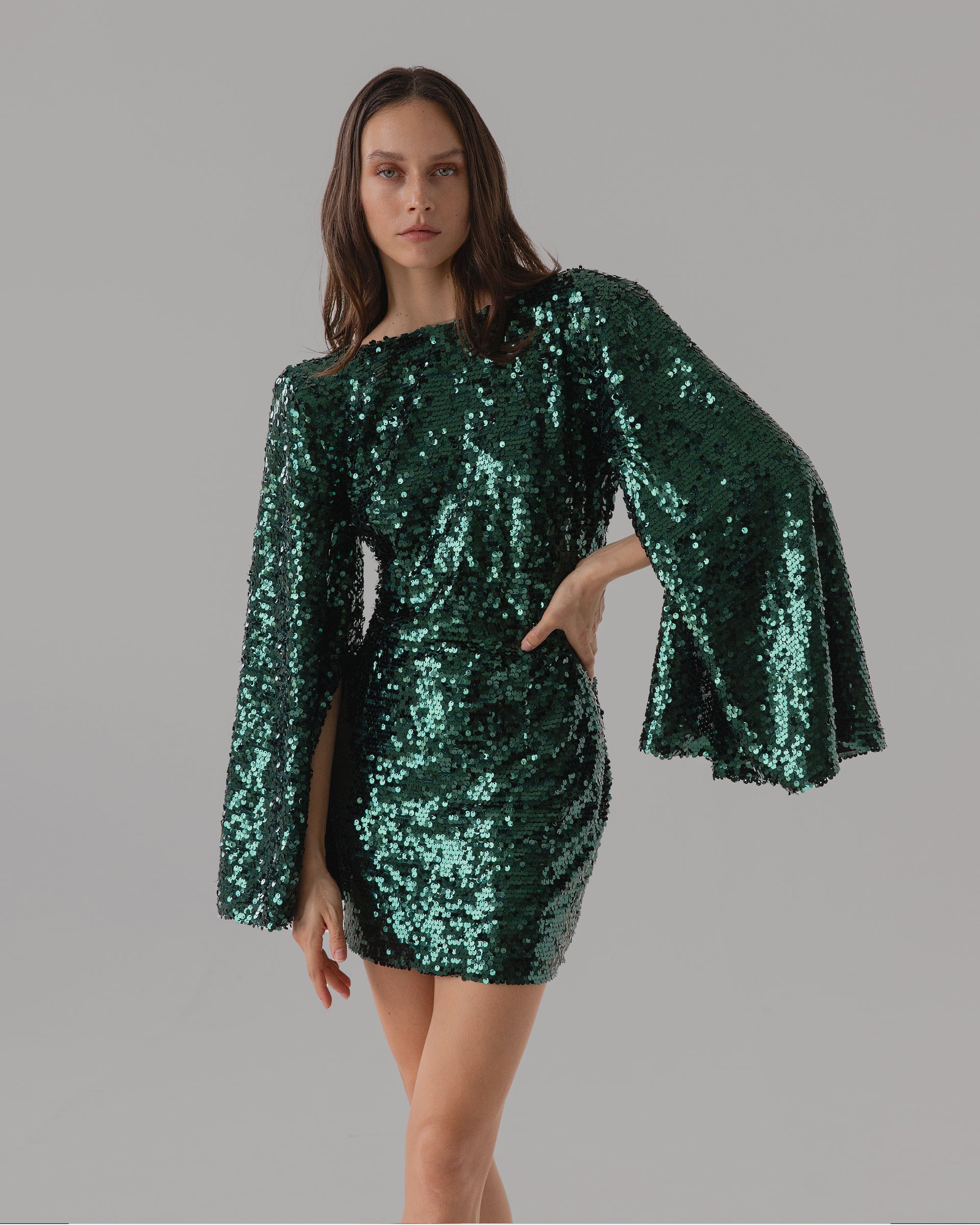 Green sequin dress with flared statement sleeves