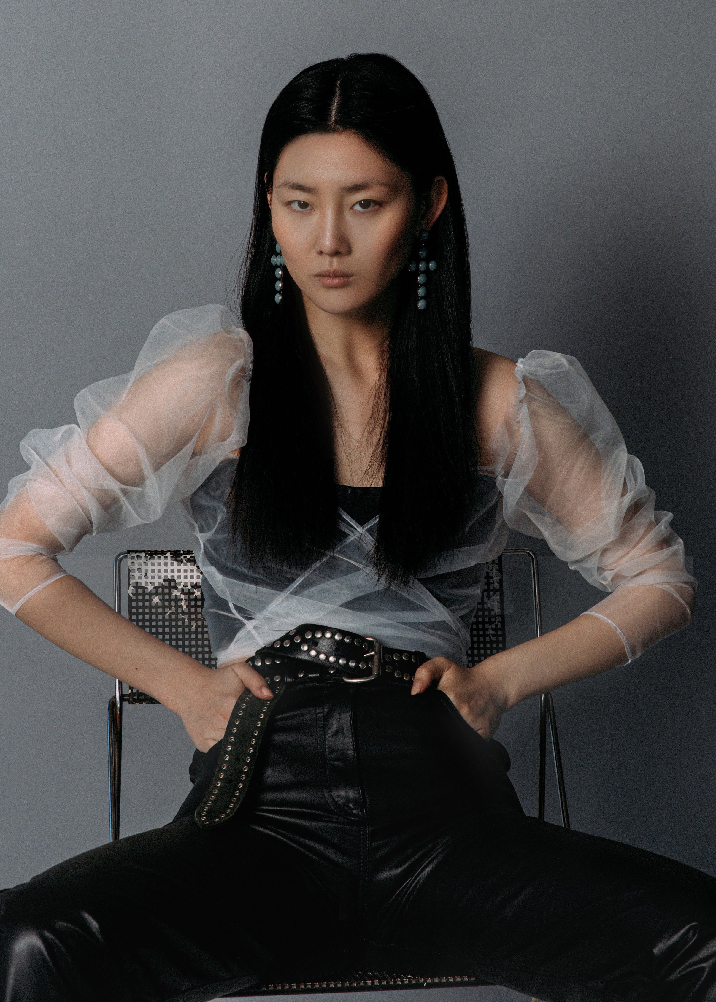 Model wears white mesh party top